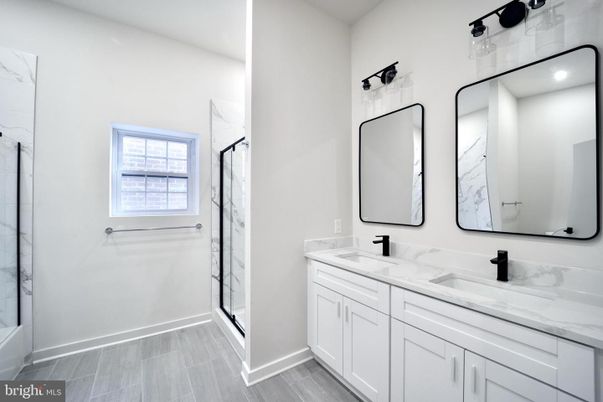 Bathroom, Dual Sink Vanities, Glass Shower, Interior, Wood Texture Flooring