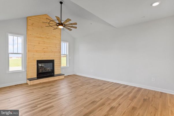Empty room, Fireplace, Interior, Recessed Lighting, Wood Texture Flooring, Wooden Walls