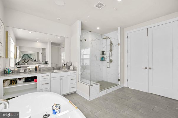 Bathroom, Dual Sink Vanities, Glass Shower, Interior, Marble Walls, Recessed Lighting