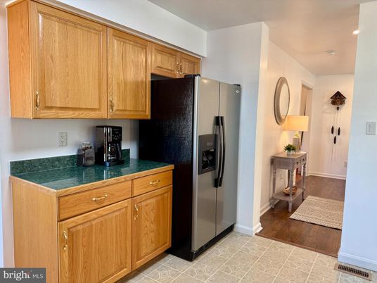 Interior, Kitchen, Recessed Lighting, Tile Countertops, Wood Texture Flooring