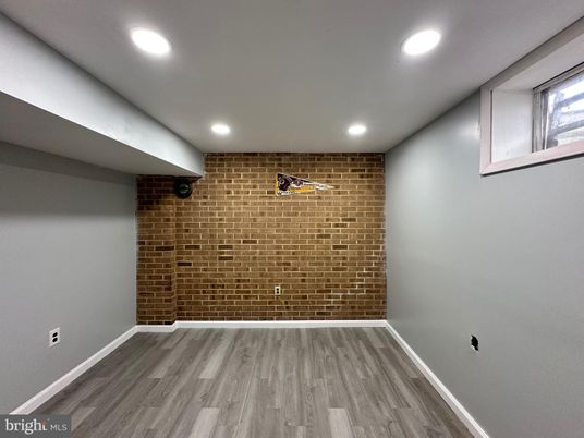 Empty room, Interior, Recessed Lighting, Stone Walls, Wood Texture Flooring