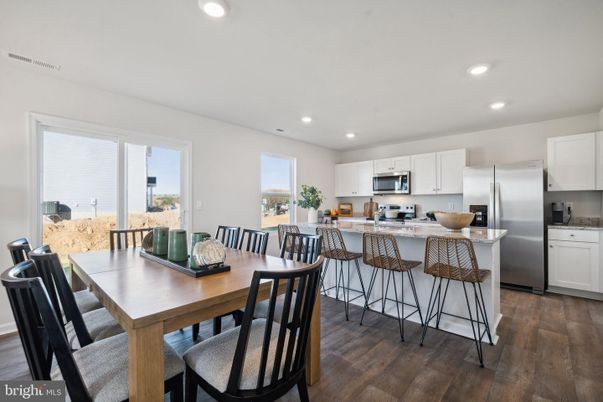 Dining room, Interior, Kitchen, Recessed Lighting, Stainless Steel Appliances, Wood Texture Flooring