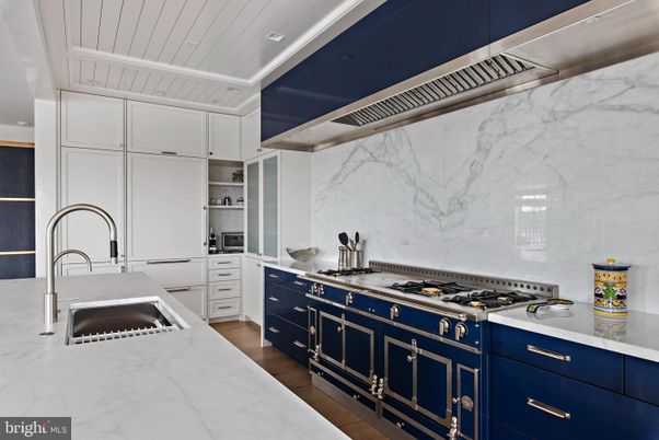 Interior, Kitchen, Marble Walls, Stainless Steel Appliances, Wood Texture Flooring