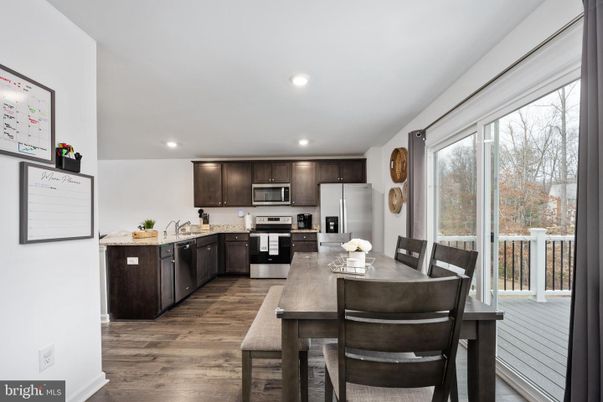 Dining room, Interior, Kitchen, Recessed Lighting, Stainless Steel Appliances, Wood Texture Flooring