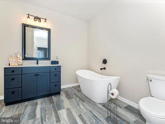 Bathroom, Dual Sink Vanities, Free Standing Baths, Interior, Wood Texture Flooring