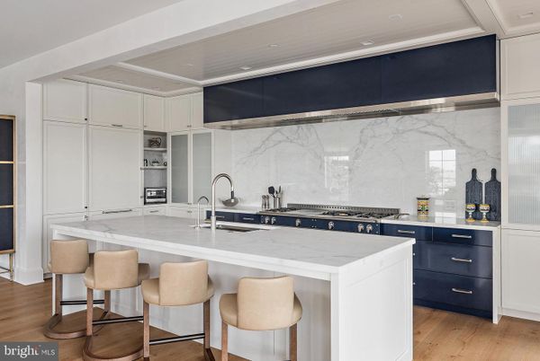 Interior, Kitchen, Marble Walls, Recessed Lighting, Stainless Steel Appliances, Wood Texture Flooring