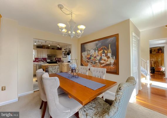 Chandelier, Dining room, Interior, Kitchen, Stainless Steel Appliances, Wood Texture Flooring