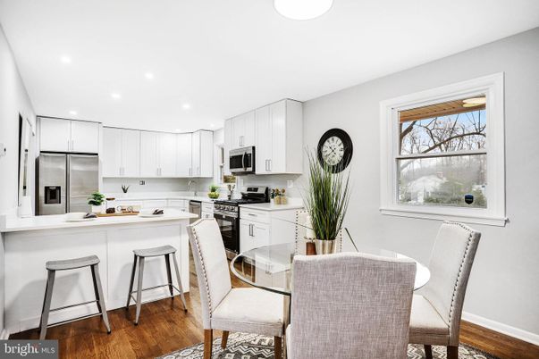 Dining room, Interior, Kitchen, Recessed Lighting, Stainless Steel Appliances, Wood Texture Flooring
