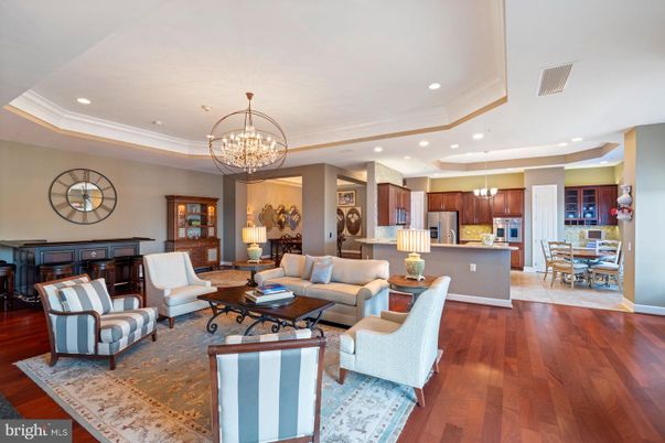 Chandelier, Dining room, Interior, Kitchen, Living room, Pendant Lights, Recessed Lighting, Stainless Steel Appliances, Wood Texture Flooring
