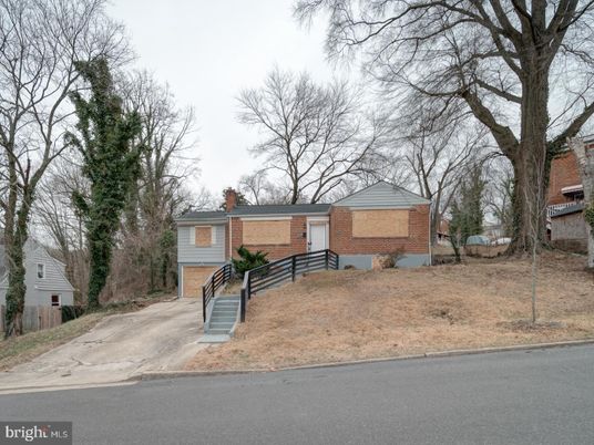 Attached, Exterior, Facade, Brick Facade, None