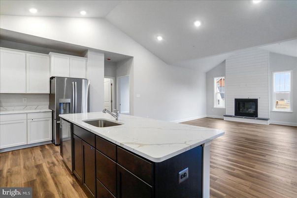 Fireplace, Interior, Kitchen, Recessed Lighting, Wood Texture Flooring