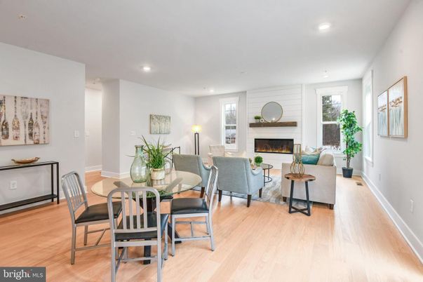 Dining room, Fireplace, Interior, Living room, Recessed Lighting, Wood Texture Flooring