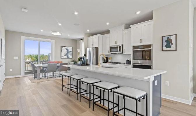 Dining room, Interior, Kitchen, Recessed Lighting, Stainless Steel Appliances, Wood Texture Flooring