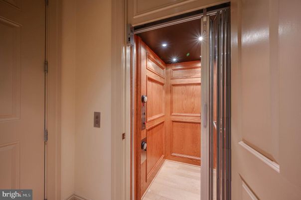 Elevator, Interior, Recessed Lighting, Wooden Ceilings, Wood Texture Flooring, Wooden Walls