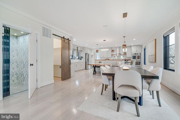 Dining room, Interior, Kitchen, Pendant Lights, Recessed Lighting, Stainless Steel Appliances, Wood Texture Flooring
