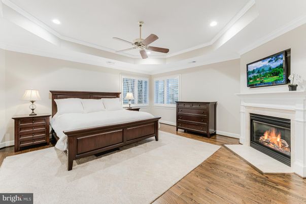 Bedroom, Fireplace, Interior, Recessed Lighting, Wood Texture Flooring