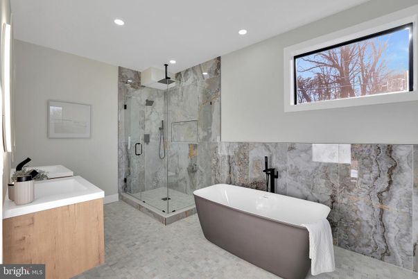 Bathroom, Free Standing Baths, Glass Shower, Interior, Marble Walls, Recessed Lighting
