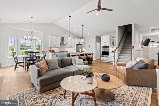 Chandelier, Dining room, Interior, Kitchen, Living room, Pendant Lights, Recessed Lighting, Stainless Steel Appliances, Wood Texture Flooring