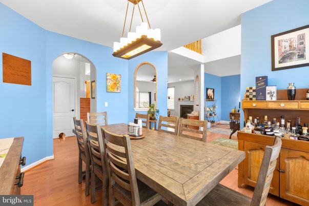 Dining room, Fireplace, Interior, Pendant Lights, Wood Texture Flooring