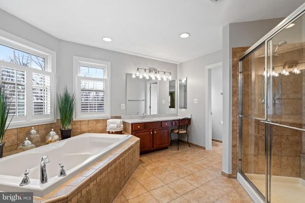 Bathroom, Dual Sink Vanities, Glass Shower, Interior, Recessed Lighting, Tile Countertops