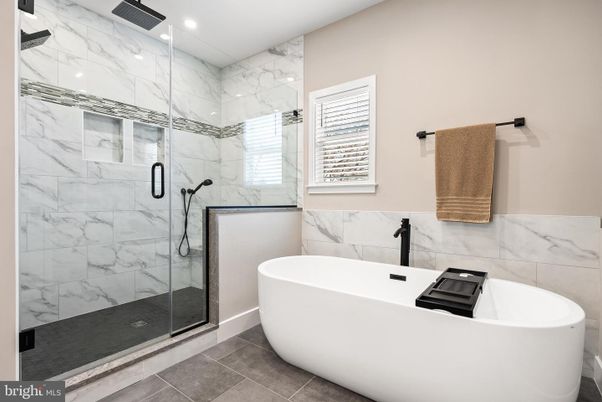 Bathroom, Free Standing Baths, Glass Shower, Interior, Marble Walls, Recessed Lighting