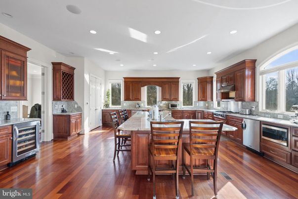 Dining room, Interior, Kitchen, Recessed Lighting, Stainless Steel Appliances, Wood Texture Flooring