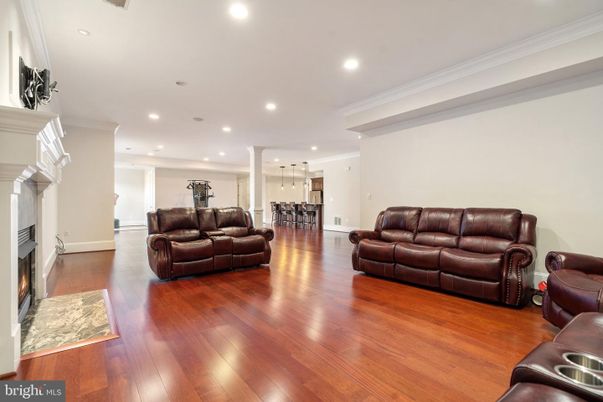 Dining room, Fireplace, Interior, Living room, Pendant Lights, Recessed Lighting, Wood Texture Flooring
