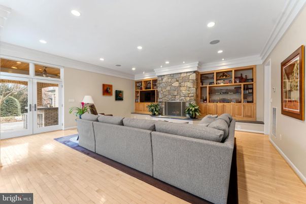 Fireplace, Interior, Living room, Recessed Lighting, Stone Walls, Wood Texture Flooring