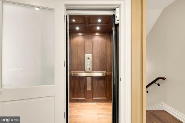 Elevator, Interior, Recessed Lighting, Wooden Ceilings, Wood Texture Flooring, Wooden Walls