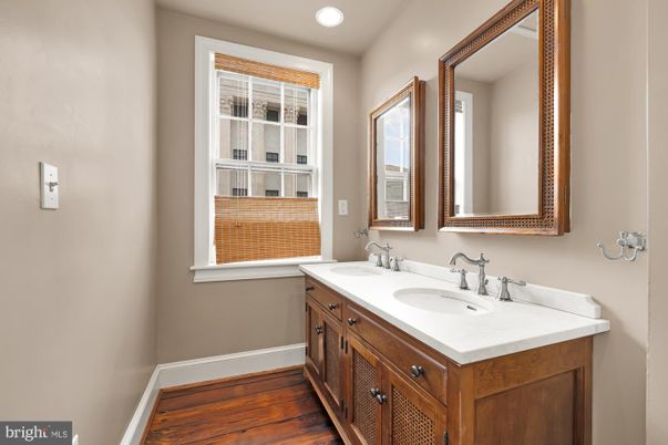Bathroom, Dual Sink Vanities, Interior, Recessed Lighting, Wood Texture Flooring