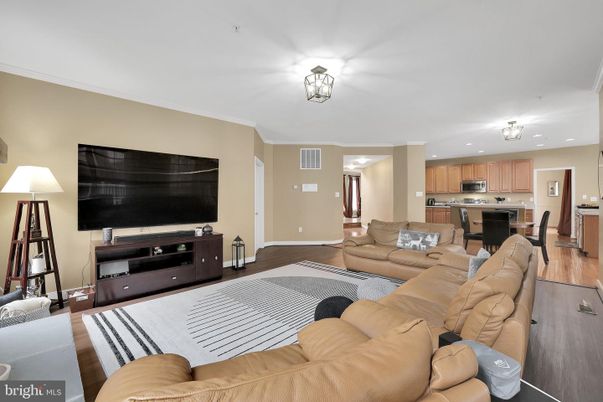 Dining room, Interior, Kitchen, Living room, Recessed Lighting, Stainless Steel Appliances, Wood Texture Flooring