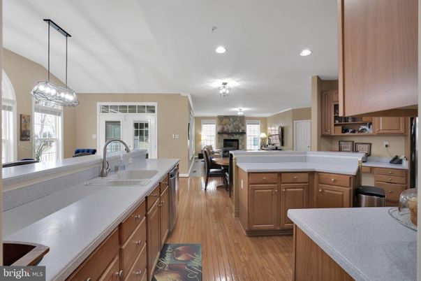 Dining room, Fireplace, Interior, Kitchen, Pendant Lights, Recessed Lighting, Wood Texture Flooring