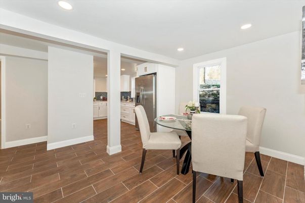 Dining room, Interior, Kitchen, Recessed Lighting, Stainless Steel Appliances, Wood Texture Flooring