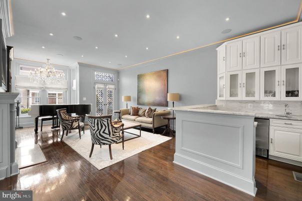 Chandelier, Dining room, Fireplace, Interior, Kitchen, Living room, Recessed Lighting, Wood Texture Flooring
