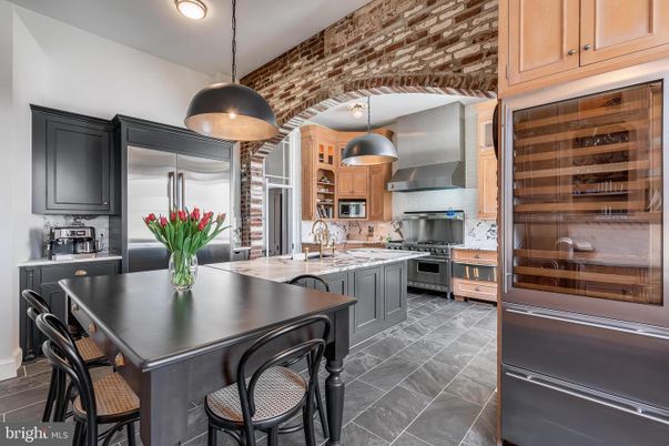 Interior, Kitchen, Pendant Lights, Stainless Steel Appliances, Stone Walls