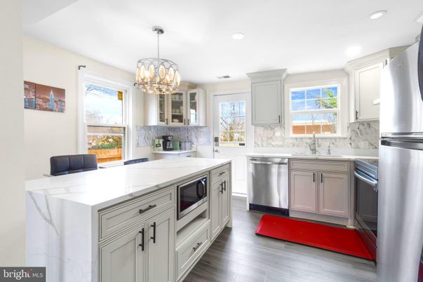 Chandelier, Interior, Kitchen, Recessed Lighting, Stainless Steel Appliances, Wood Texture Flooring