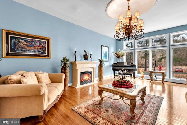 Chandelier, Fireplace, Interior, Living room, Piano, Wood Texture Flooring