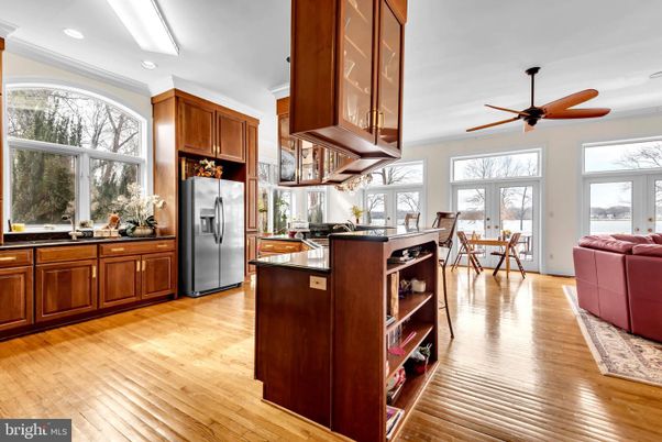Dining room, Interior, Kitchen, Living room, Recessed Lighting, Stainless Steel Appliances, Wood Texture Flooring