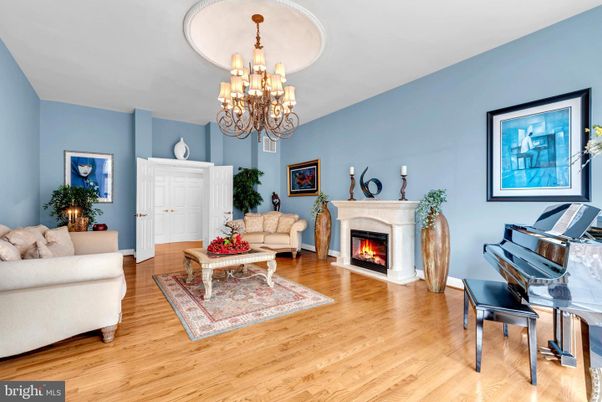 Chandelier, Fireplace, Interior, Living room, Piano, Wood Texture Flooring