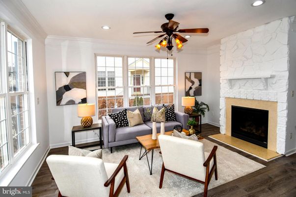 Fireplace, Interior, Living room, Recessed Lighting, Stone Walls, Wood Texture Flooring