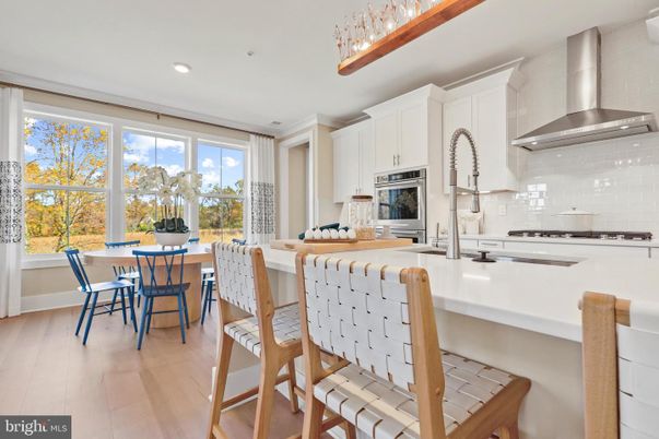 Dining room, Interior, Kitchen, Recessed Lighting, Stainless Steel Appliances, Wood Texture Flooring