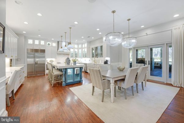 Chandelier, Dining room, Interior, Kitchen, Pendant Lights, Recessed Lighting, Stainless Steel Appliances, Wood Texture Flooring