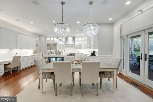 Chandelier, Dining room, Interior, Kitchen, Pendant Lights, Recessed Lighting, Stainless Steel Appliances, Wood Texture Flooring