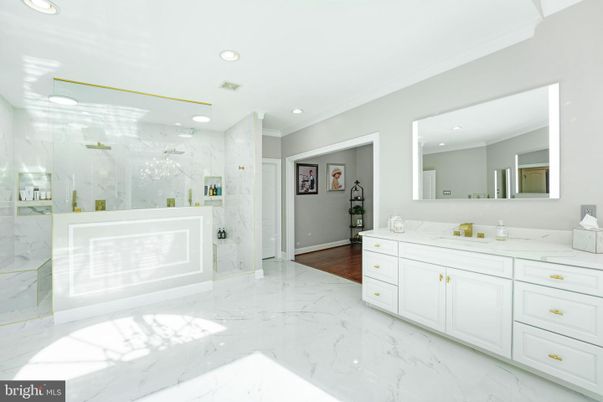Bathroom, Dual Sink Vanities, Glass Shower, Interior, Marble, Marble Walls, Recessed Lighting