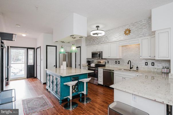 Interior, Kitchen, Pendant Lights, Stainless Steel Appliances, Wood Texture Flooring