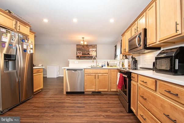 Chandelier, Interior, Kitchen, Recessed Lighting, Stainless Steel Appliances, Wood Texture Flooring