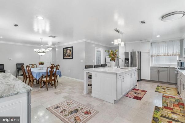 Chandelier, Dining room, Interior, Kitchen, Pendant Lights, Recessed Lighting, Stainless Steel Appliances