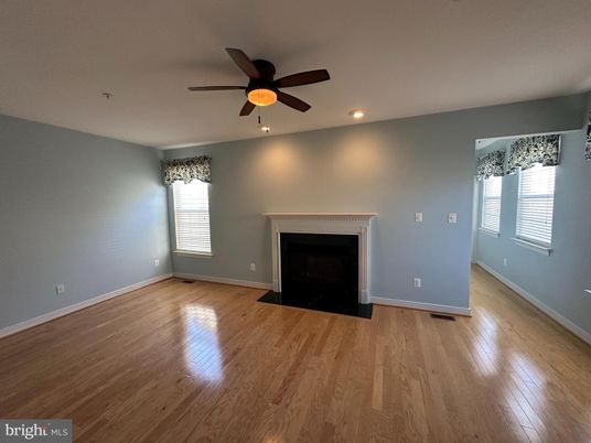Empty room, Fireplace, Interior, Recessed Lighting, Wood Texture Flooring