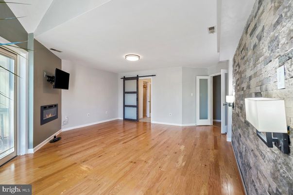 Empty room, Fireplace, Interior, Stone Walls, Wood Texture Flooring