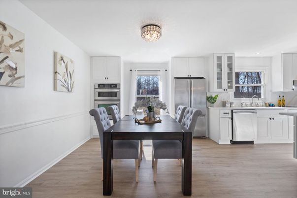 Dining room, Interior, Kitchen, Recessed Lighting, Stainless Steel Appliances, Wood Texture Flooring